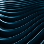Abstract, wavy lines in a blue, metallic hue.